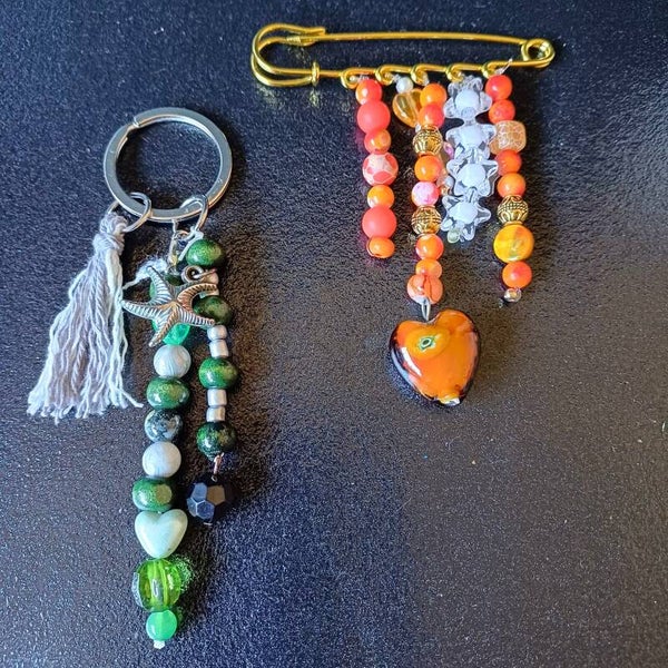 broche speld en een tassenhanger