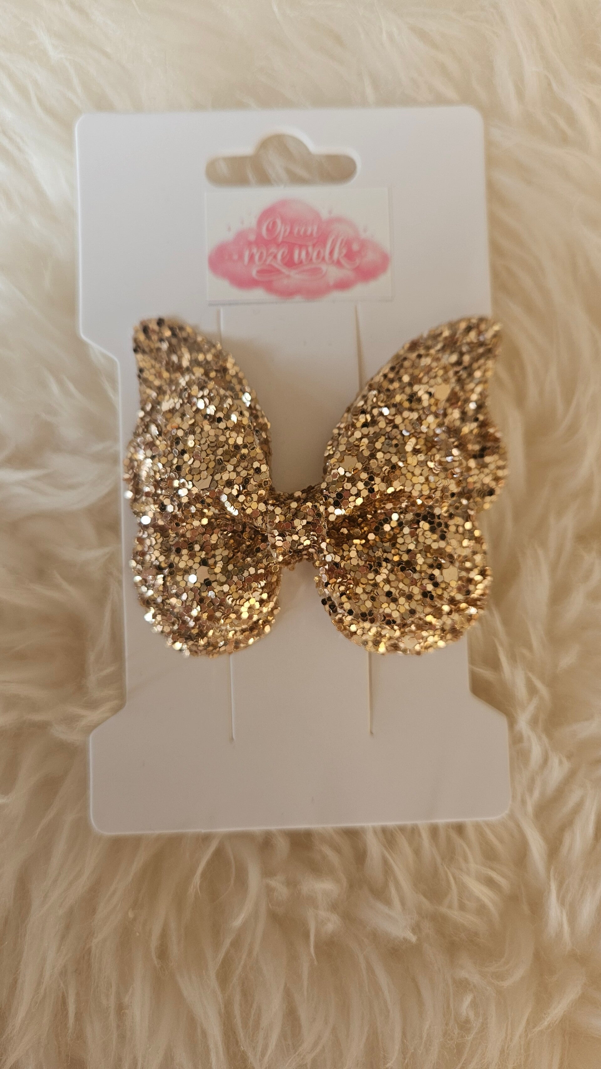 Vlinder haarclip glitter goud