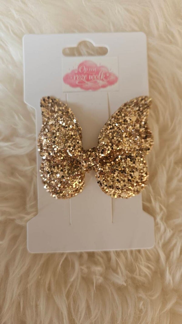 Vlinder haarclip glitter goud