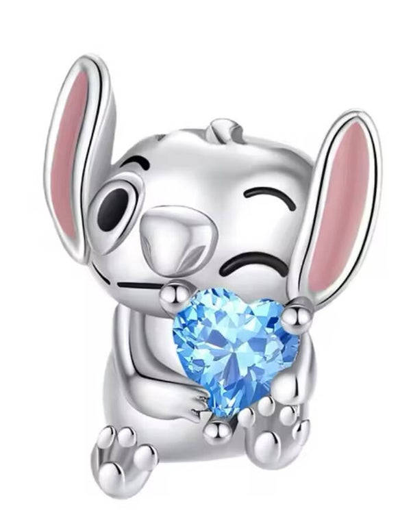 Bedel Stitch met blauw steentje zilver