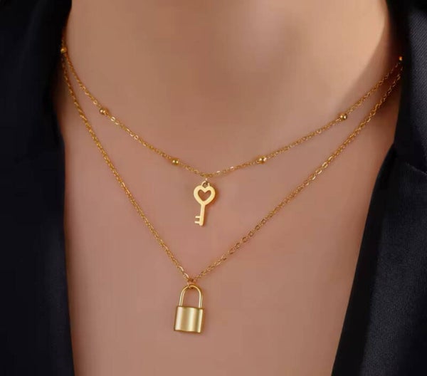 Ketting Slot met Sleutel goud stainless steel