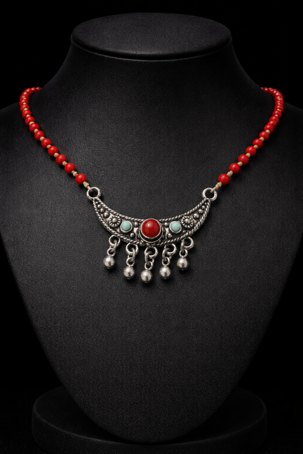 Bohemian ketting met koraal en turquoise accenten