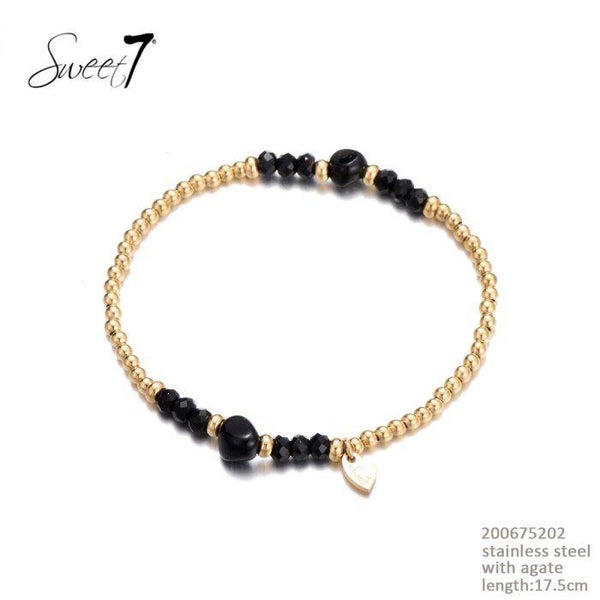 Sweet7 armband met goudkleur gecombineerd met zwart, blauw, paars ...