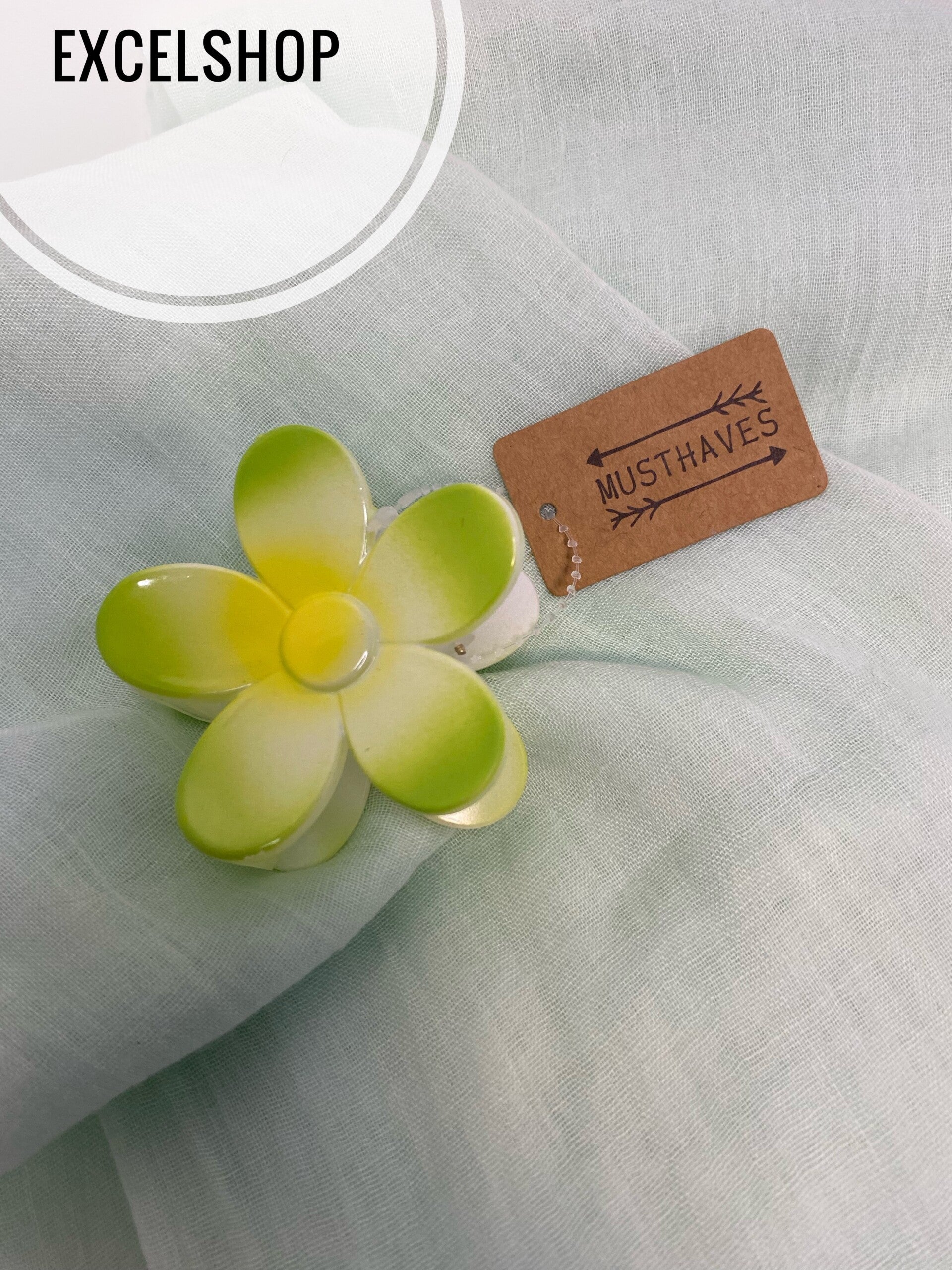 Haarclip margriet licht groen