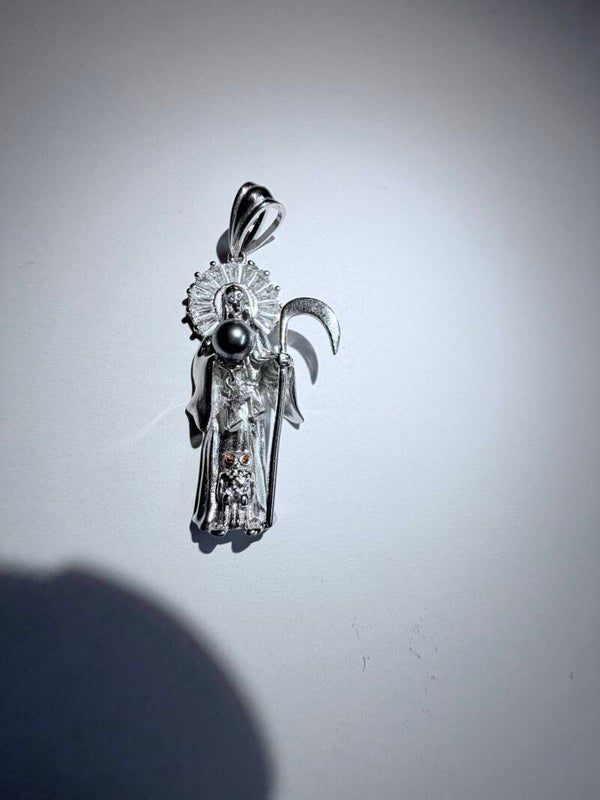 Amuleto de la santa muerte