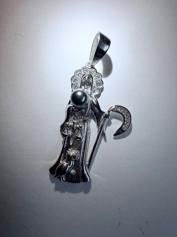 Amuleto de la santa muerte
