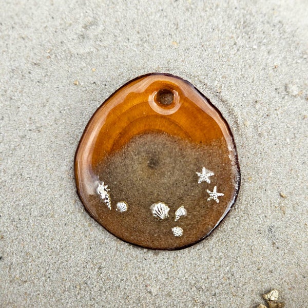 Tag zand en decoratie zilver°