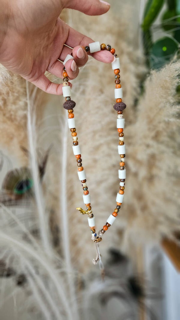 Pearly Ticchu oranje/bruin 51cm°