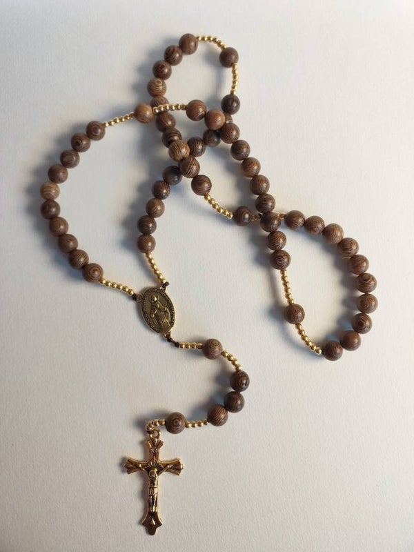 Rosary of humble golden heart of Mary