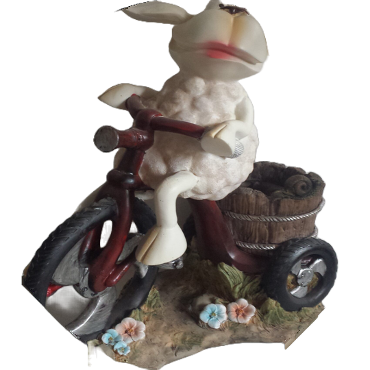 Funny schaap met mand op fiets 35 cm