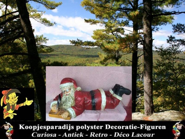 AHF7 schrijvende Kerst man liggend polyester résine 60 cm