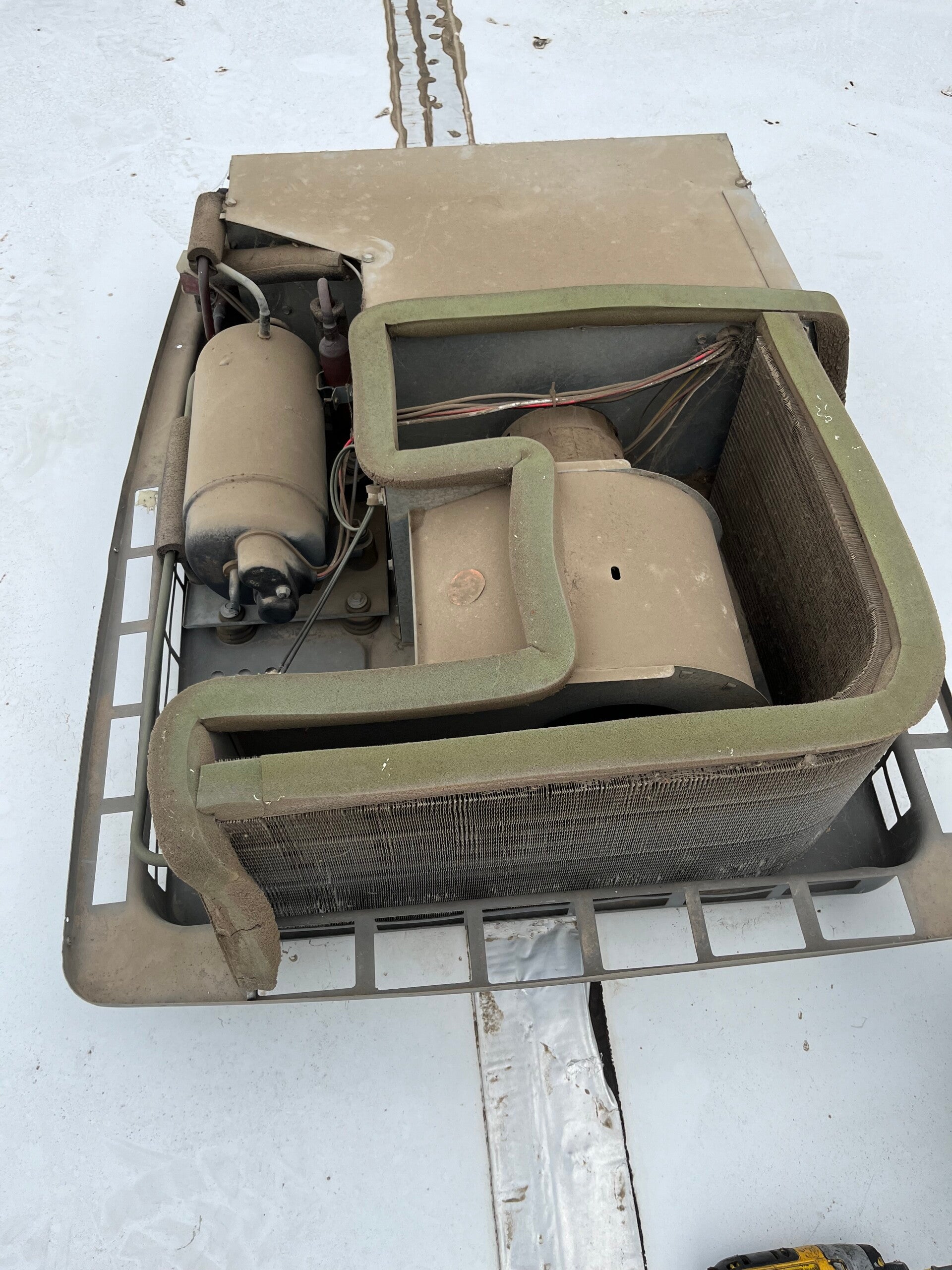 On-site mobile RV repair - dometic AC condensor coil cleaning during a mobile call out.