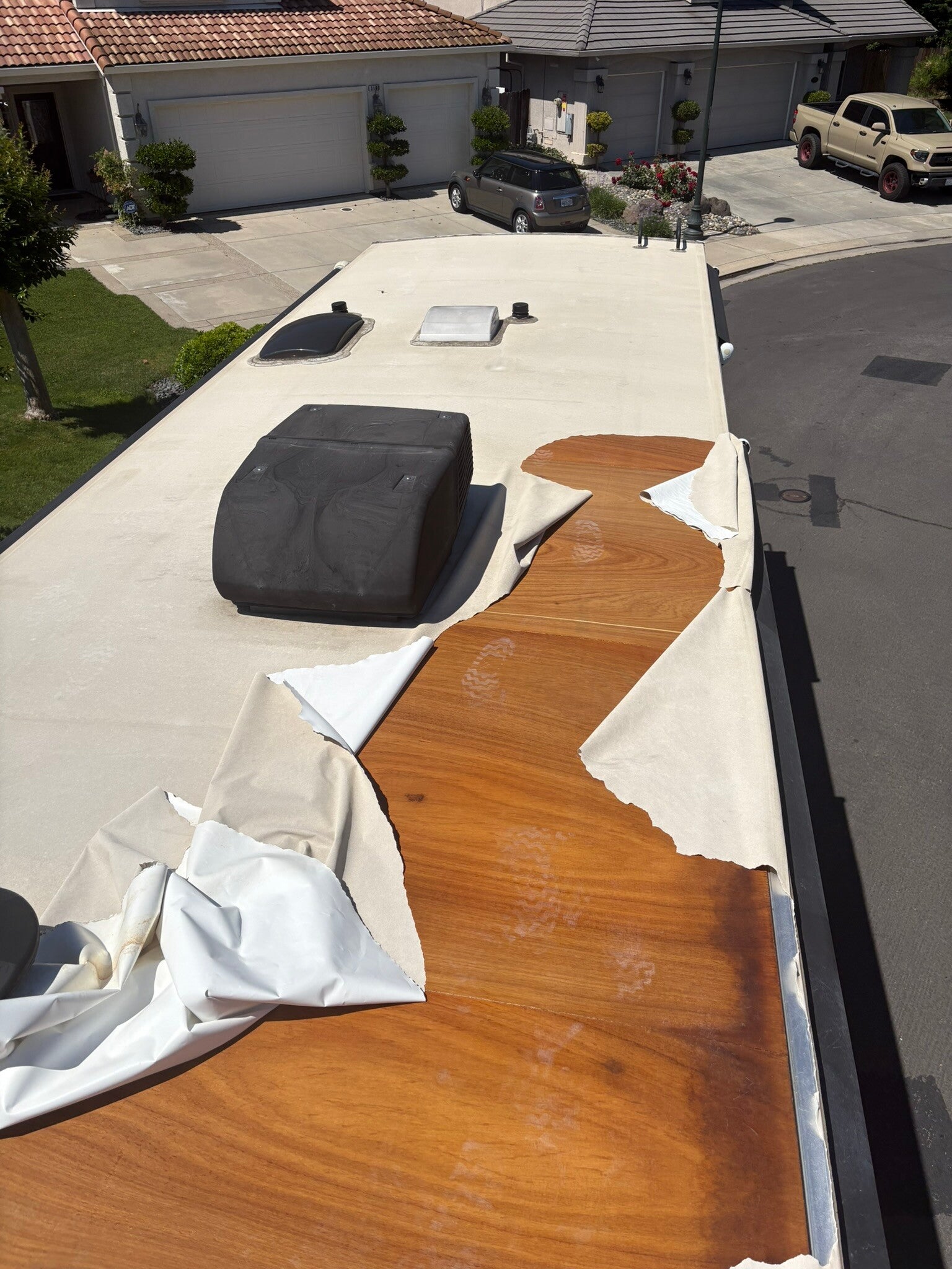 Front section water damage repair on motorhome roof – soft spot removed and rebuilt on-site