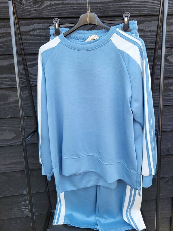 Comfyset blauw met witten bies