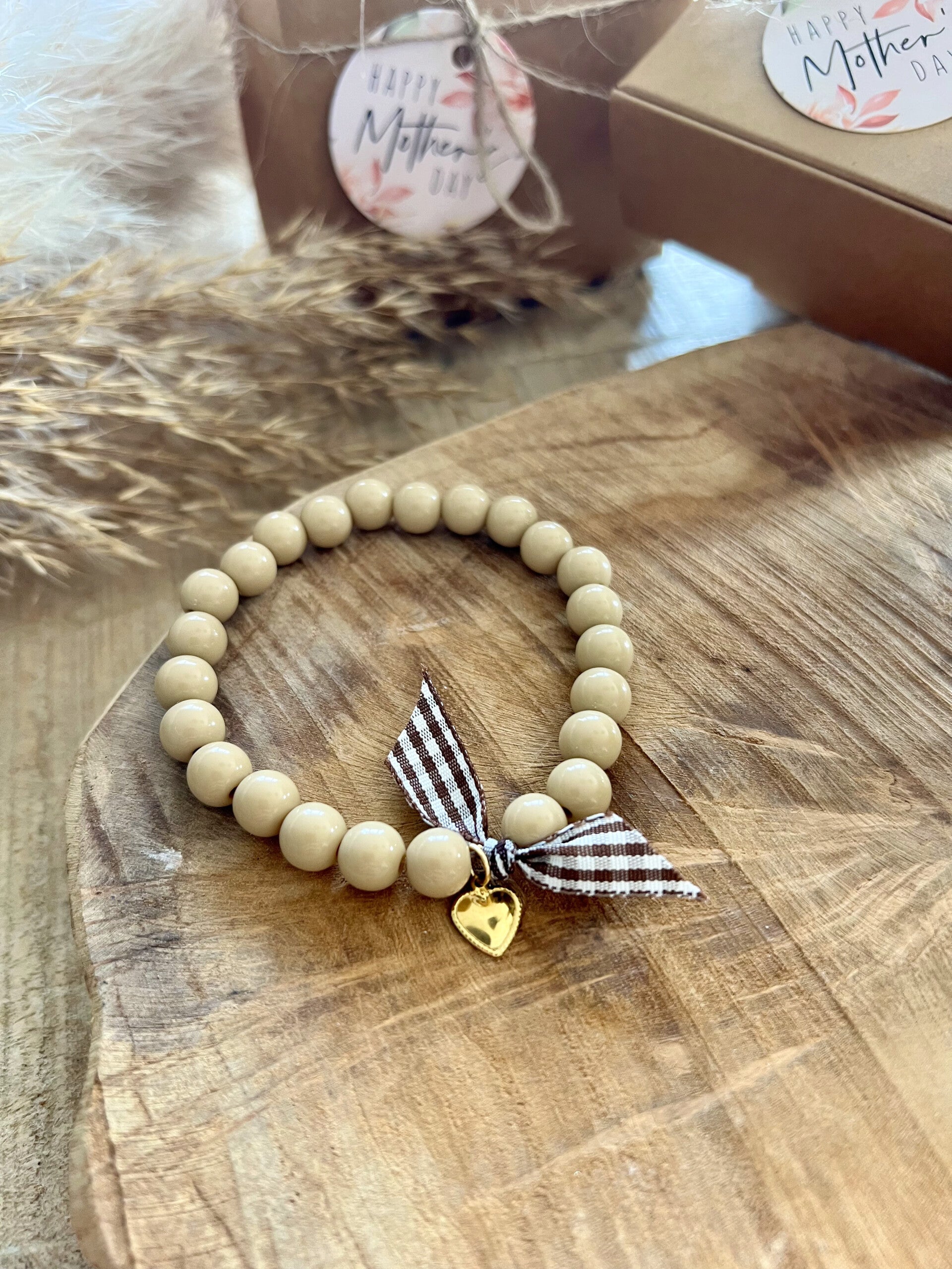 Bracelet beige coeur