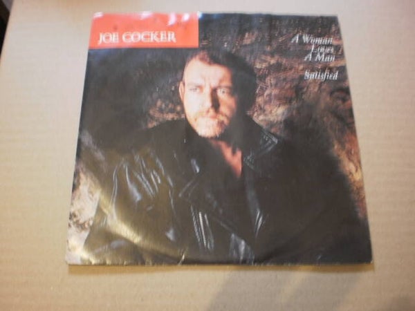 Single Joe Cocker - A woman loves a man