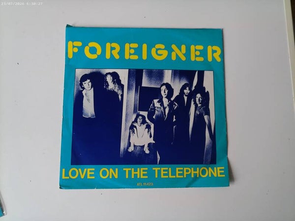 Single Foreigner - Love on the Telephone / Women