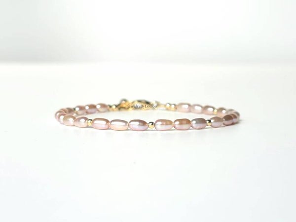 Zacht roze lavendel zoetwaterparel armband, 14k goldfilled - 925 sterling zilver