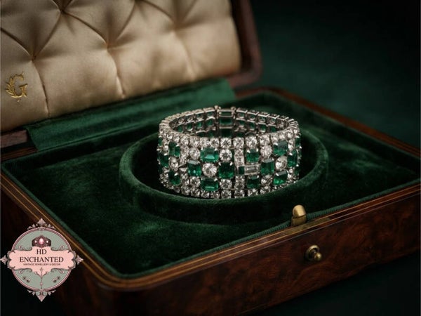 Vintage Carlo Zini bracelet features alternating rows of emerald green and clear stones in a silver-tone metal.