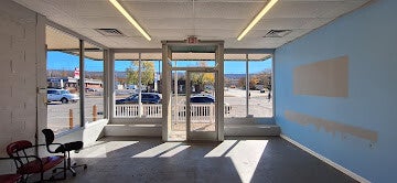 Interior commercial glass door and storefront window cleaning by Pro Valley Renovations LLC.