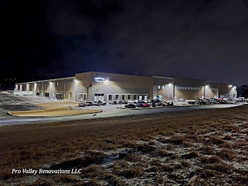Industrial warehouse exterior showcasing large-scale commercial renovation project by Pro Valley Renovations LLC.