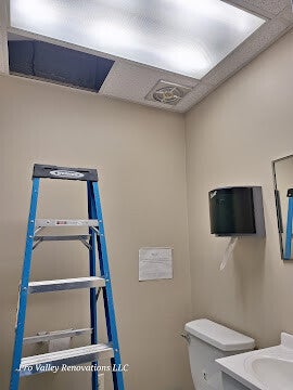 Commercial restroom ceiling repair and maintenance services by Pro Valley Renovations LLC.