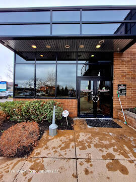 “Exterior commercial glass entrance and canopy window cleaning service by Pro Valley Renovations LLC.