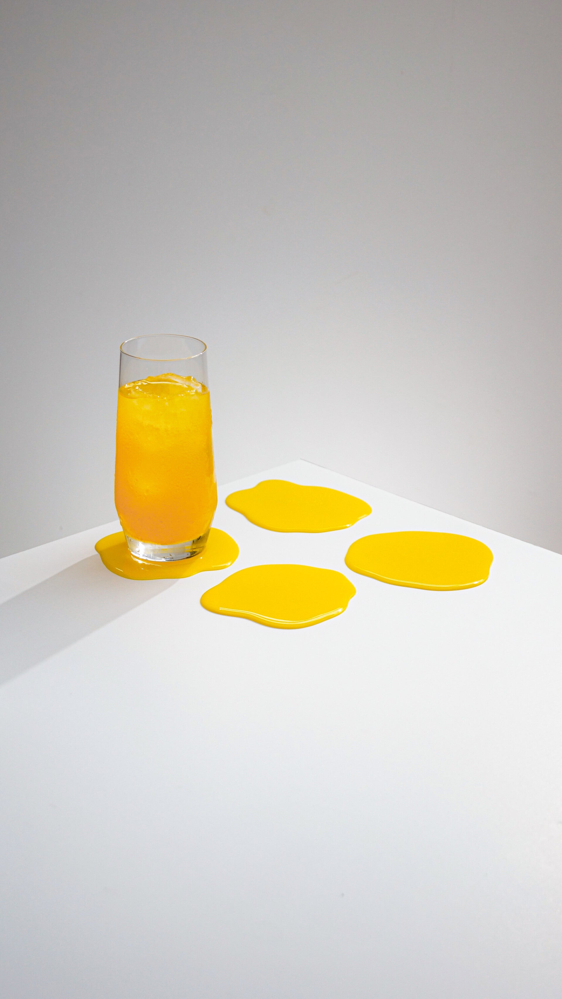 coaster studio photo yellow juice lemonade