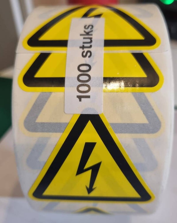 Elektrische spanningstickers rol van 1000 stuks ! W012