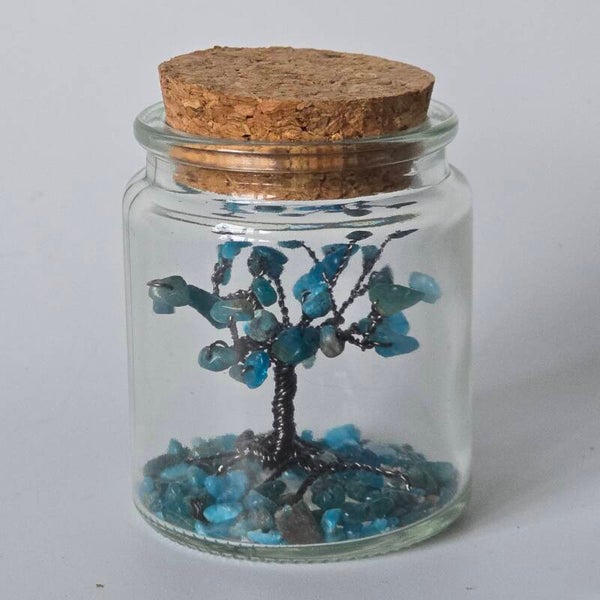 Apatiet edelsteenboompje in flesje