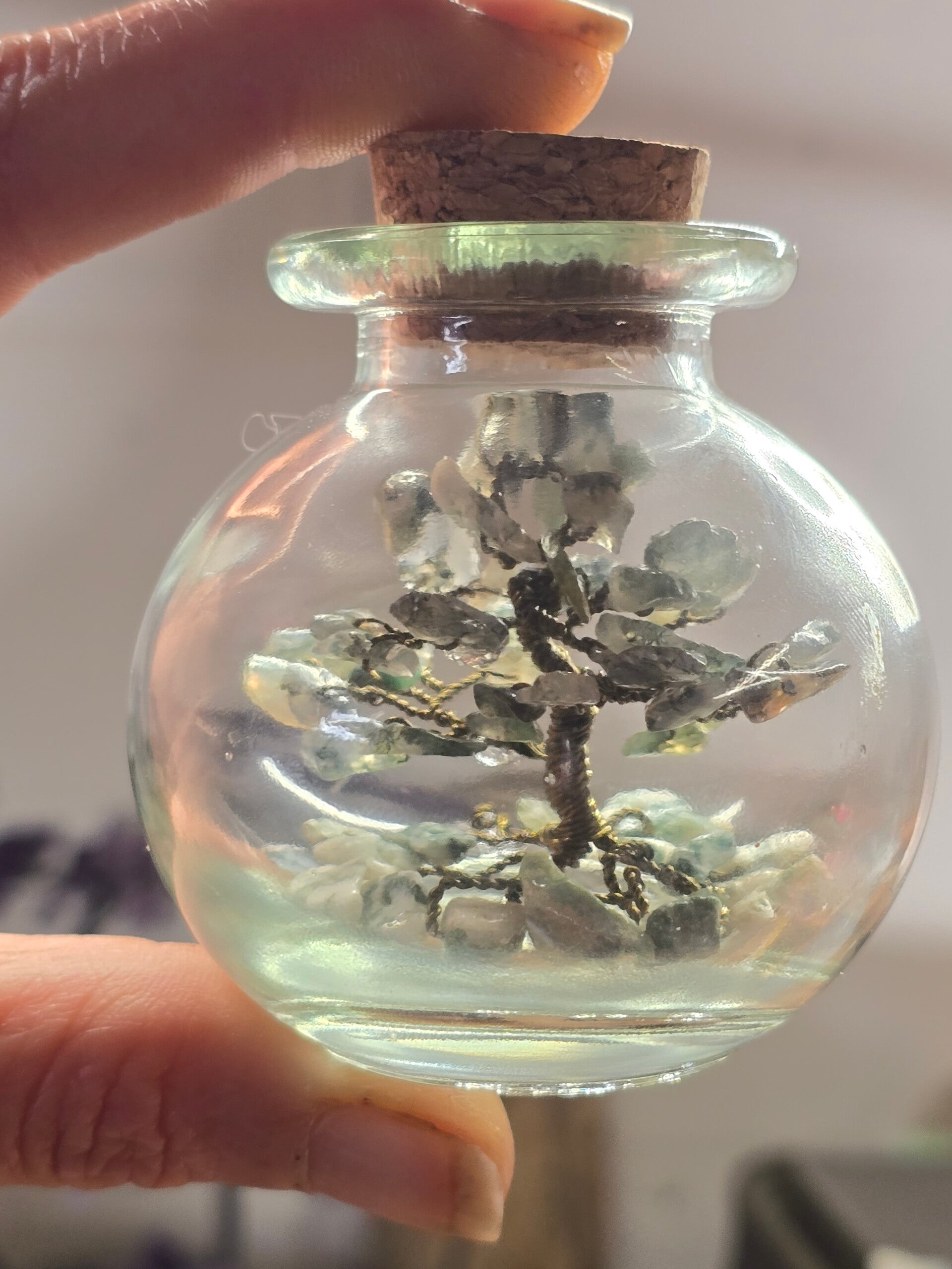 Mosagaat en boomagaat edelsteenboompje in flesje