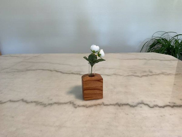Hand made wooden vase with glass tube.