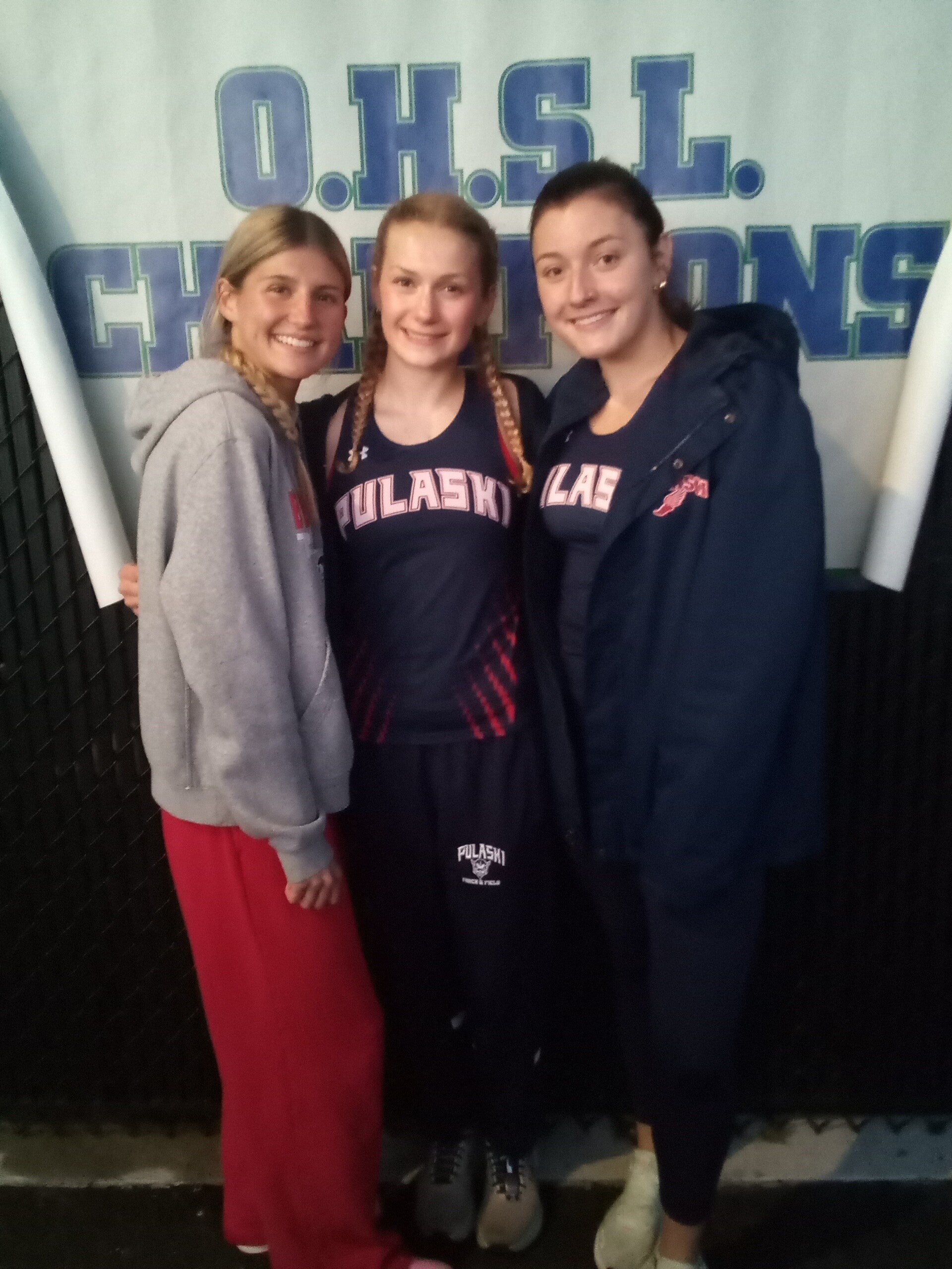Vanessa Trumble, Grace Carguello, and Kylie Dye of team champion Pulaski