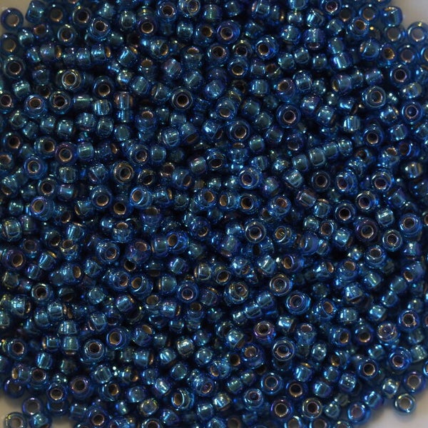 11/0-1025 Silver Lined Capri Blue AB