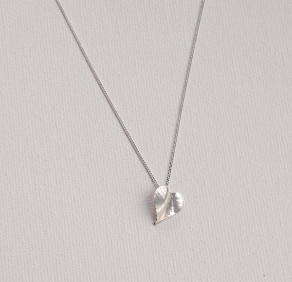 Sterling silver forged heart pendant