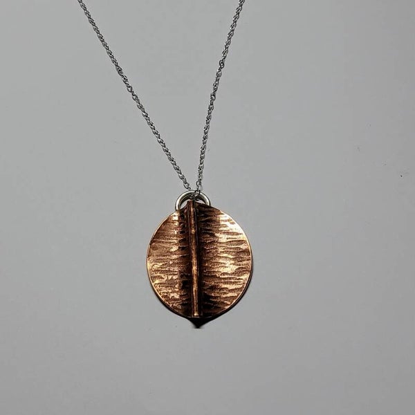 Large round folded copper pendant