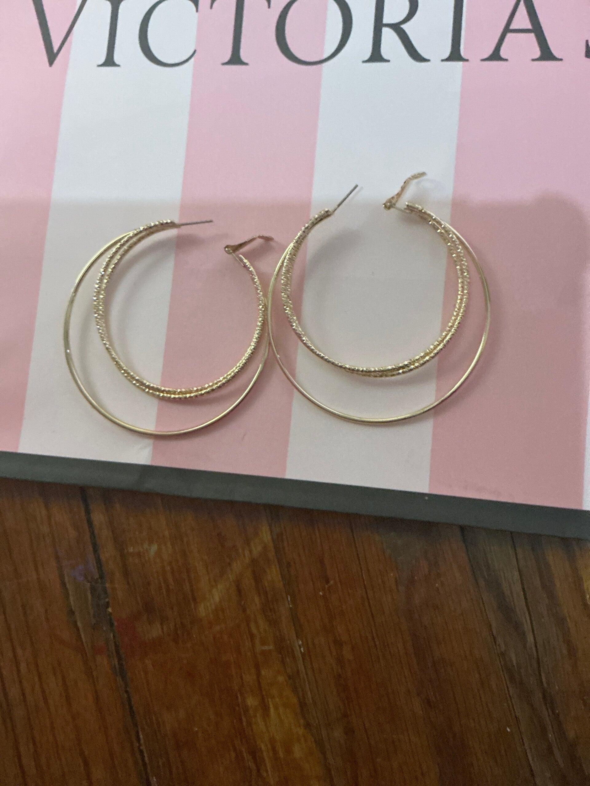 2 hoop gold earrings