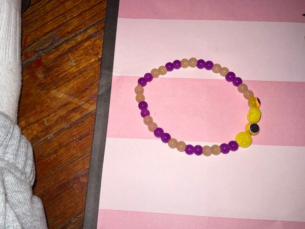 Purple and yellow evil eye bracelet