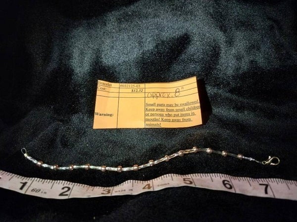 032125-03 Bracelet with clear glass beads and gold-colored round beads