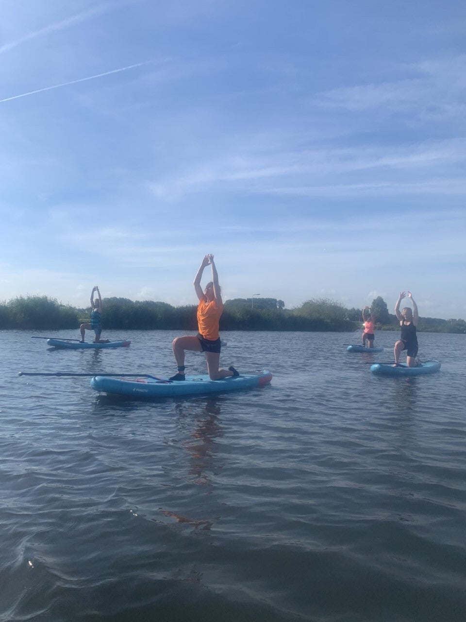 yoga op de sup, in balans op het water, go with the flow
