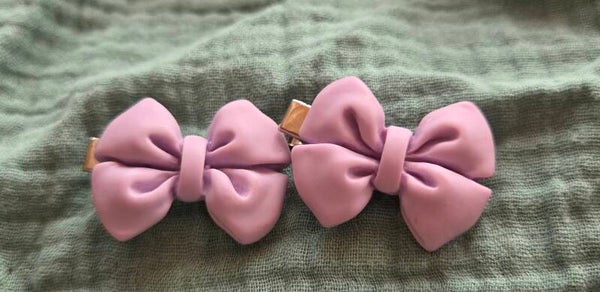 kleine strikjes klem
