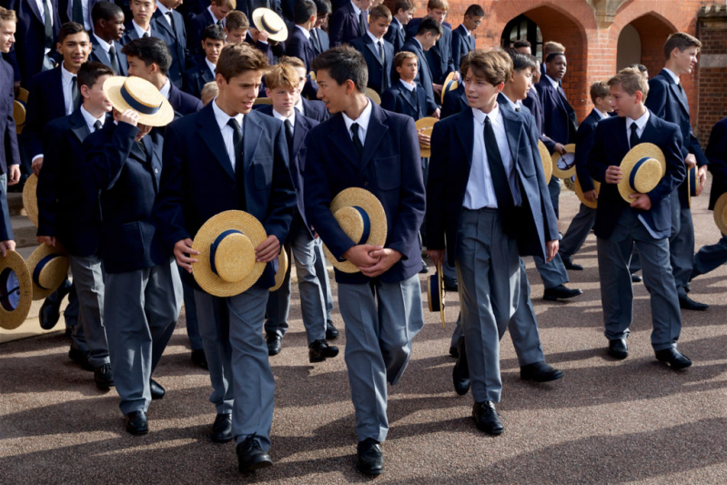 Pupils wearing traditional uniforms representing academic excellence and heritage at top UK independent schools.