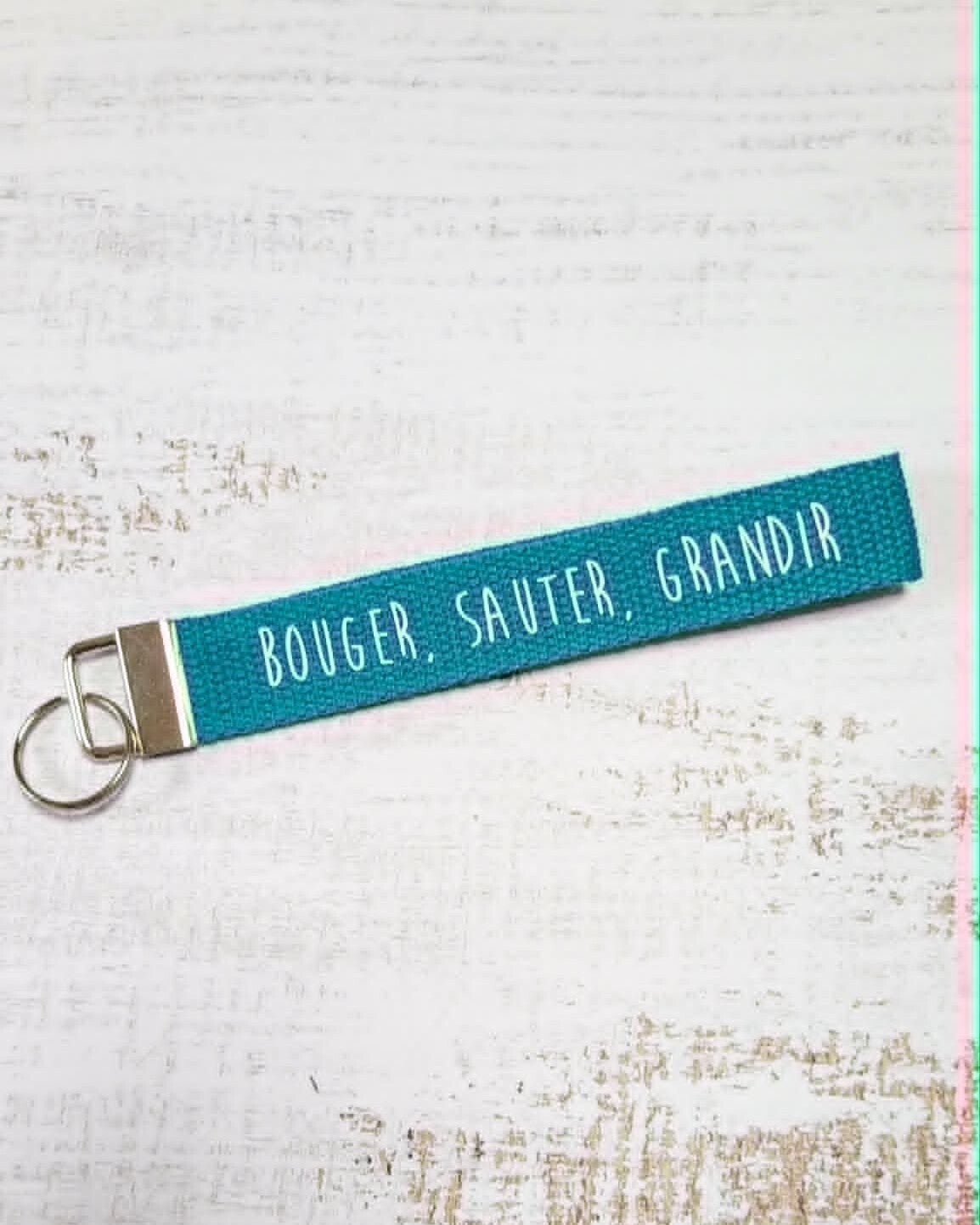 Porte-clés enseignant – Bouger, sauter, grandir