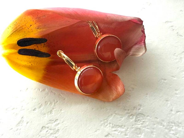 Gouden ronde steen rood roze 18K