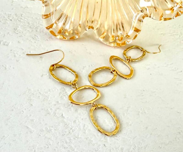 Gouden met ovalen rondes