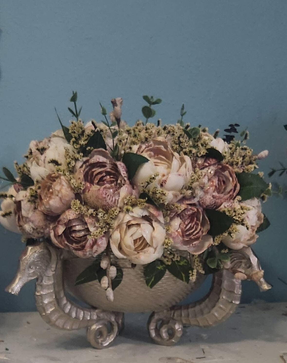 Seahorse Planter filled with blooms