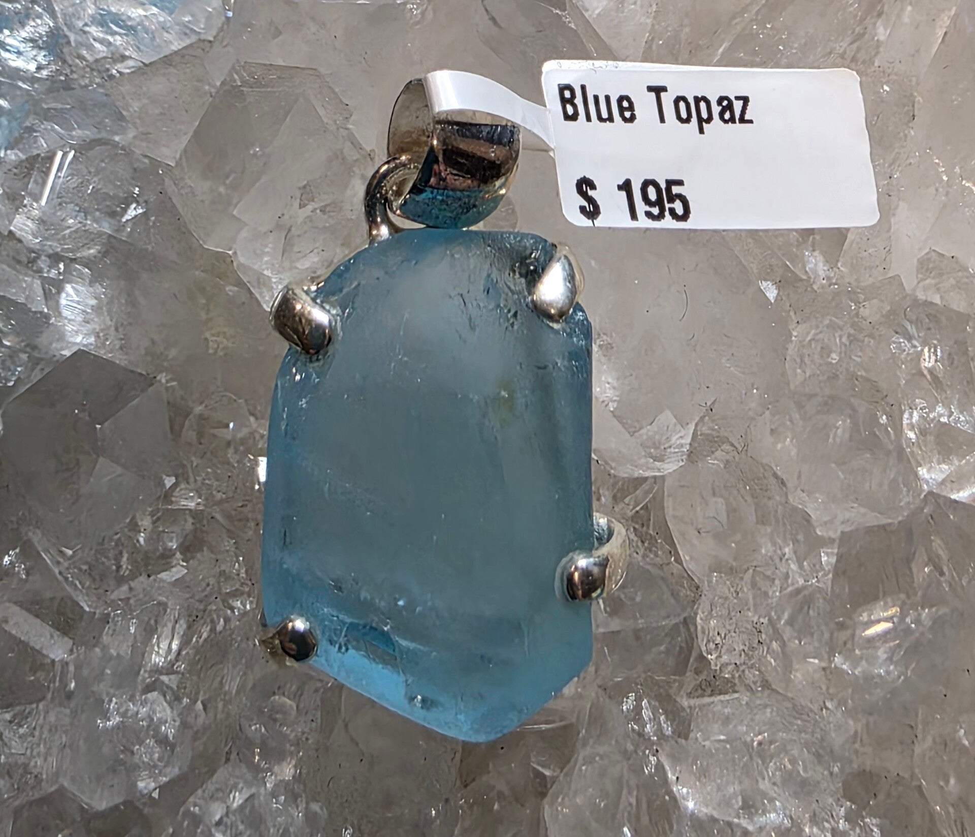 Topaz in the rough set in sterling silver