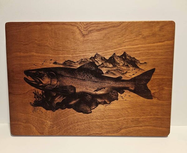 planche gravée saumon et montagnes