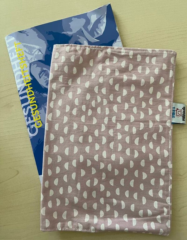 Gesundheitshefthülle Rosa mit weissen Halbmonde