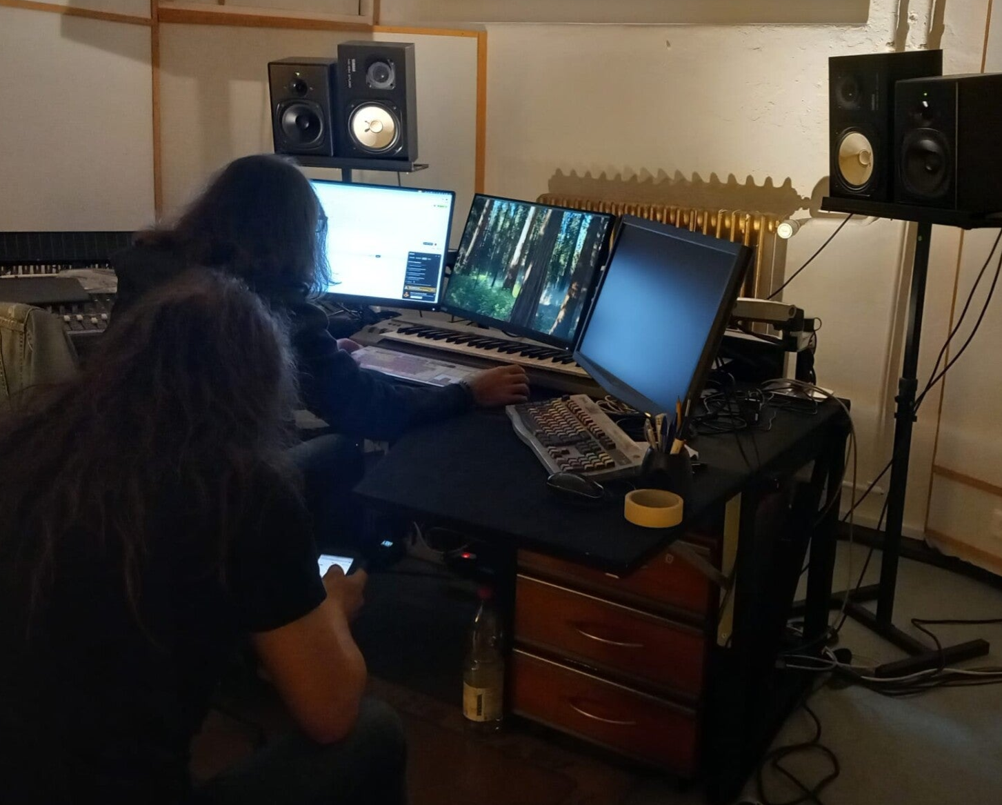 Sound engineer checking vocal takes